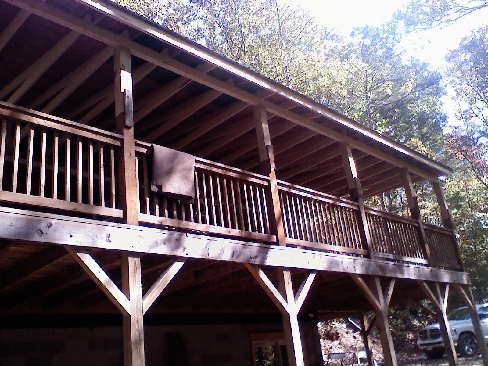 Timber framing under a new elevated porch and deck — Roof Leak Repair in Akron by Roofing Brothers